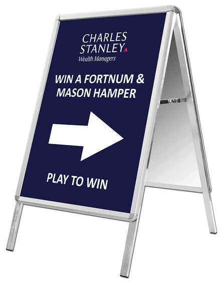 Charles Stanley A-Board Sign Design 
 Design of an A-Board sign for Charles Stanley Wealth Managers, to direct potential customers to an instore activation 
 Keywords: Signage, Pavement, Outdoor, A-Frame, Sandwich Boards, Graphics, Artwork, Directional, Arrow, Navy, Blue